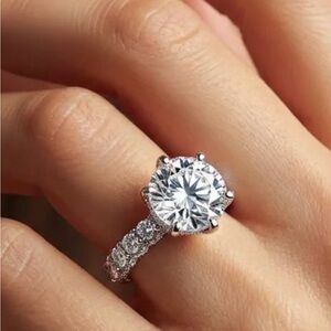 Radiant Clear-Center Silver Solitaire Ring with Pavé Band